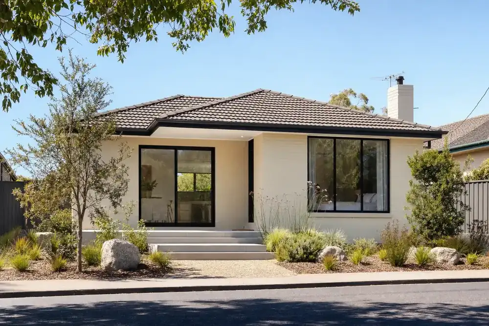 Illustration of a cream brick Melbourne house with black aluminium windows